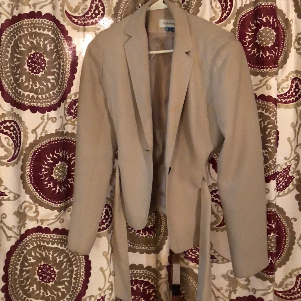 A Sleek CK Waist Accentuating Blazer